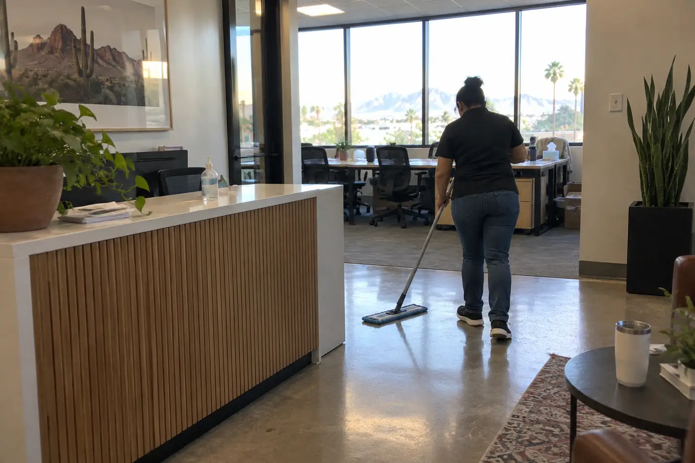 Commercial janitorial cleaning crew preparing a small Phoenix office lobby